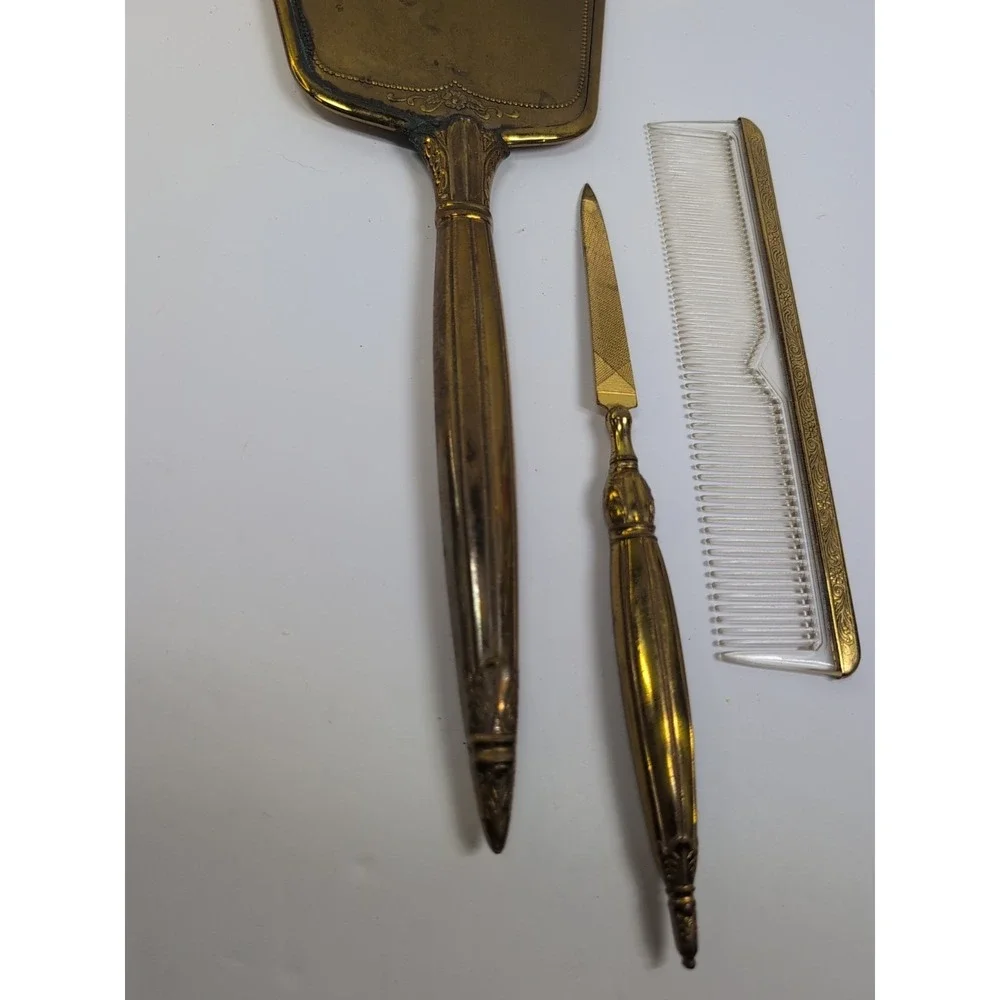 VINTAGE Ornate HANDHELD 3 PC VANITY SET MIRROR FILE COMB GOLD TONE